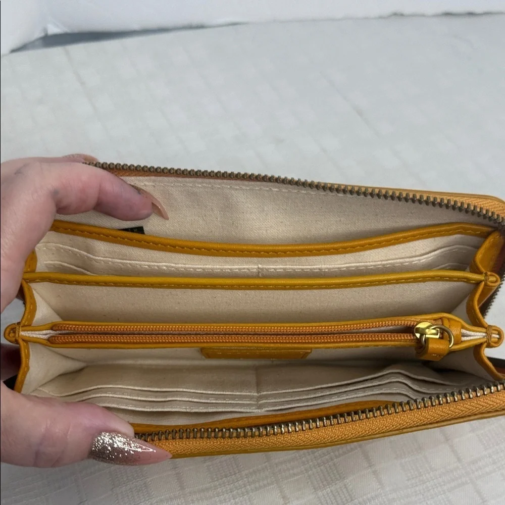 Margot Anna Zip Around Leather Wallet in marigold yellow.